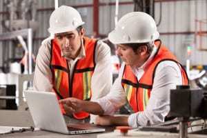 men-inside-industrial-plant