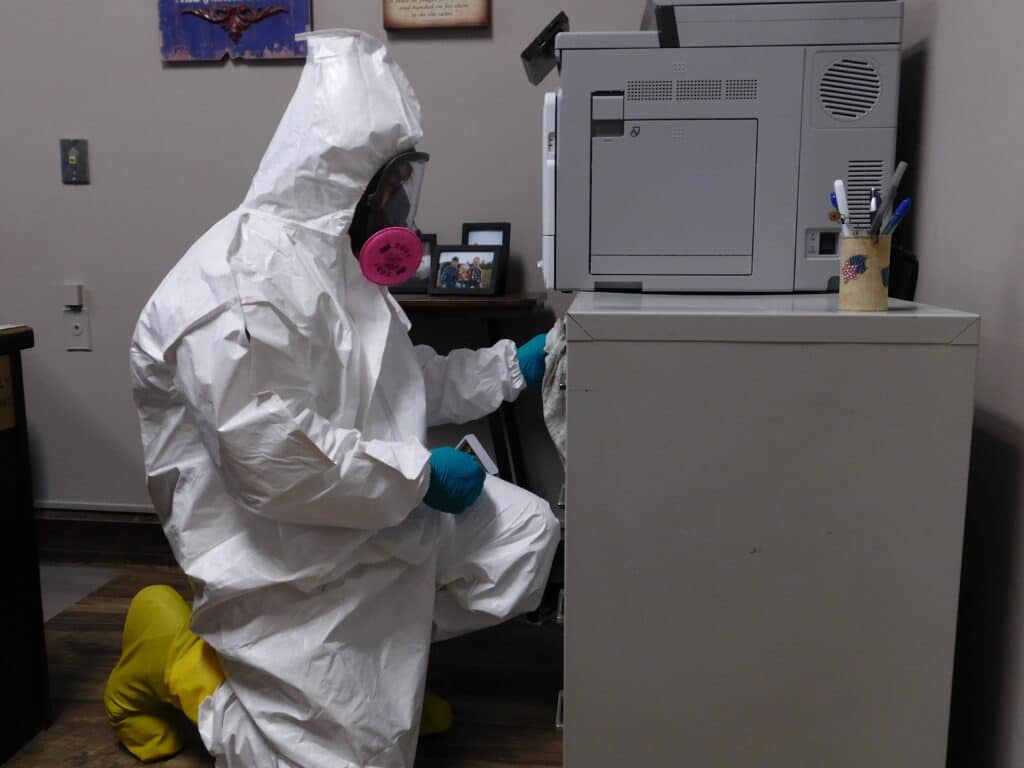 On Knees Cleaning Copier