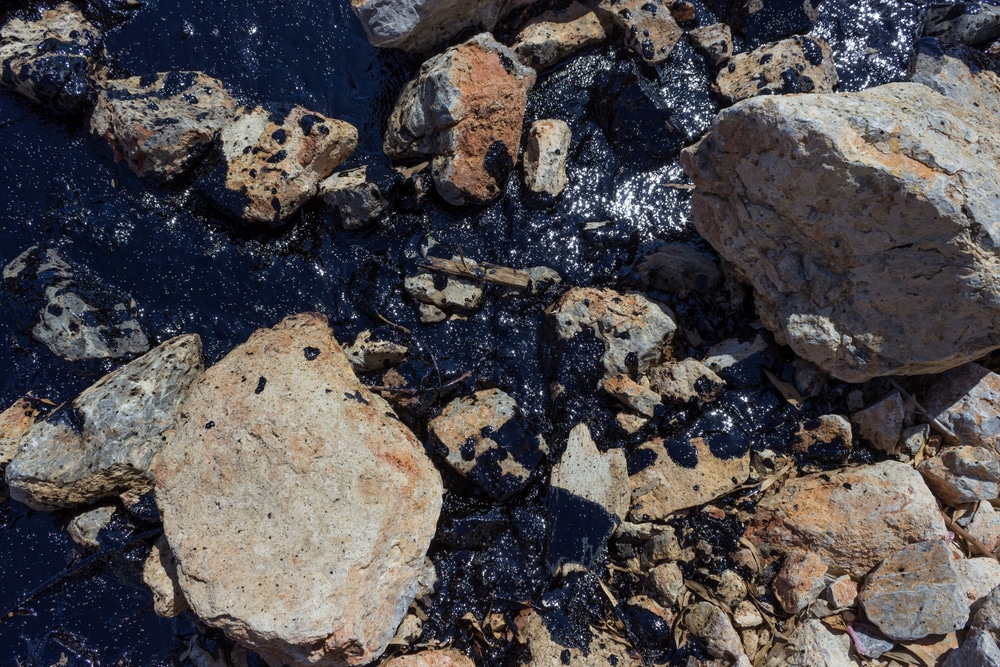 Oil spilled on rocks